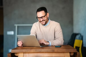 small_business-man-working-on-laptop-at-home-office-rem-2024-11-15-02-02-12-utc
